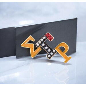 Sigma Gamma‎ Rho Brooch